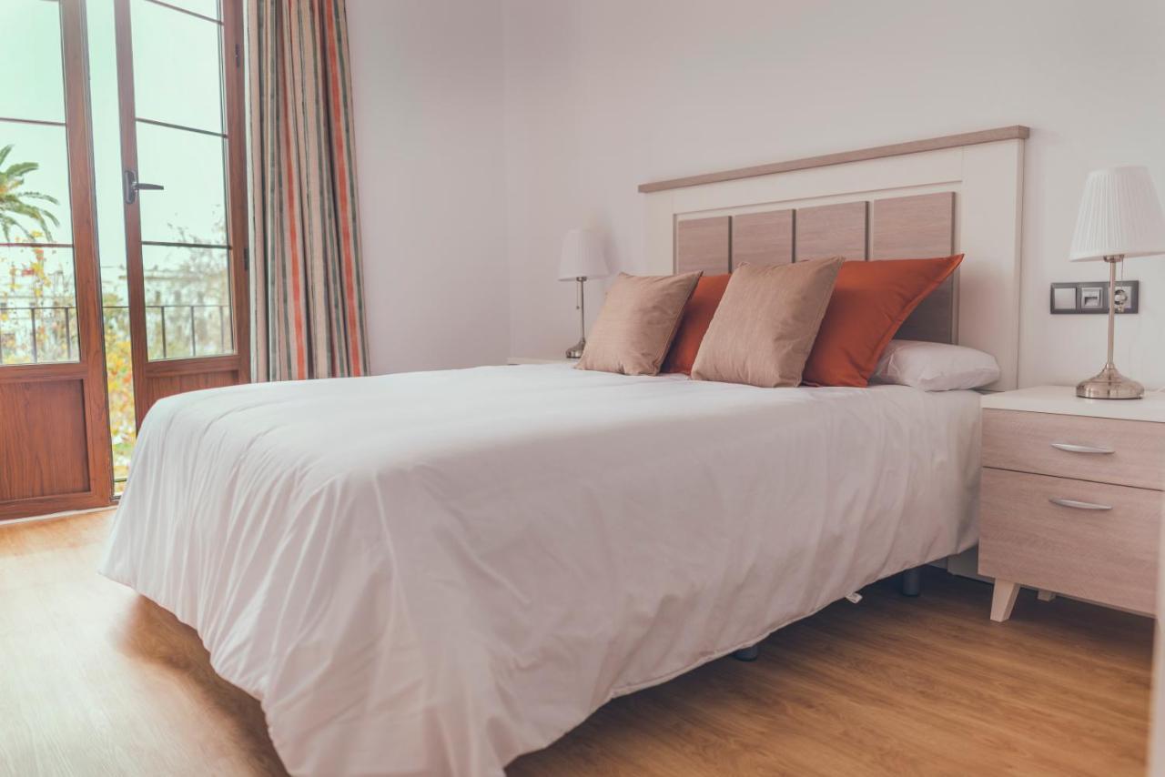 Apartamentos Puerta Sevilla ヘレス エクステリア 写真